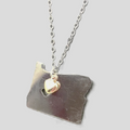 Oregon state silver necklace on white