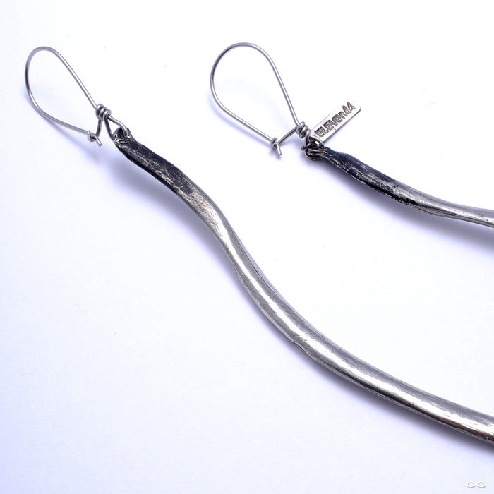 Bone Earrings from Eleven44 in White Brass