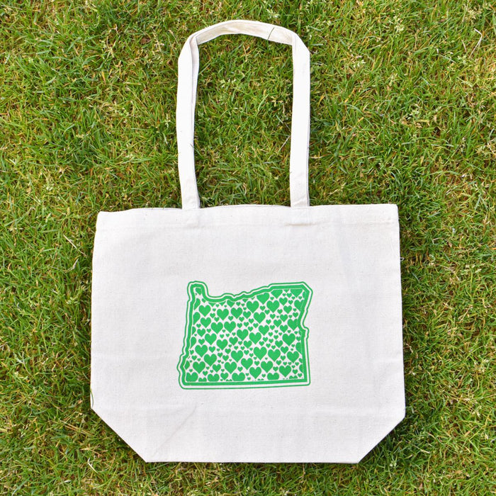 Cascade Provisions Oregon Hearts Tote on grass