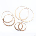 Classic Hoop Earrings from Tawapa in yellow-gold-plated brass