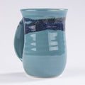 Clay In Motion Raging Rapid Handwarmer Mug Left Hand