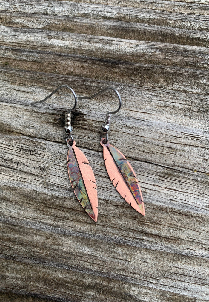 Copper Mini Feather Earrings close-up, small statement feather earrings with stainless steel ear wires and unique copper finish