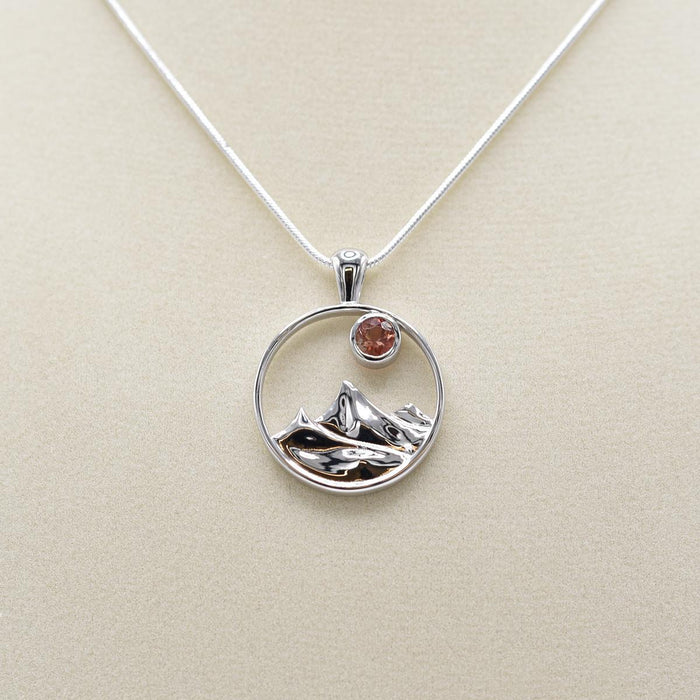 Desert Sun Gems Mountain Charm Sunstone Necklace on jewelry form