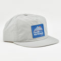 Grafletics PNW Peak Hat on table