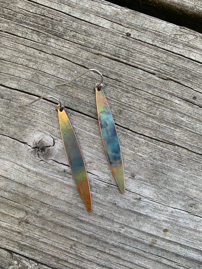 Long Oval dangle earrings showcasing unique handcrafted copper coloring and an approximately 2-inch drop
