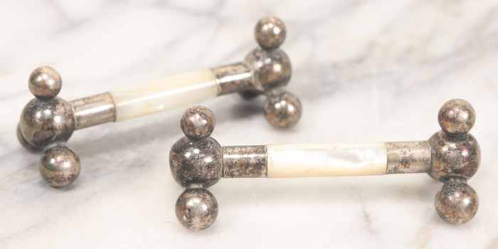 Lot 037 - Pair Of Antique Silverplate And Mother Of Pearl Knife Rests, 3-1/2" Long Each