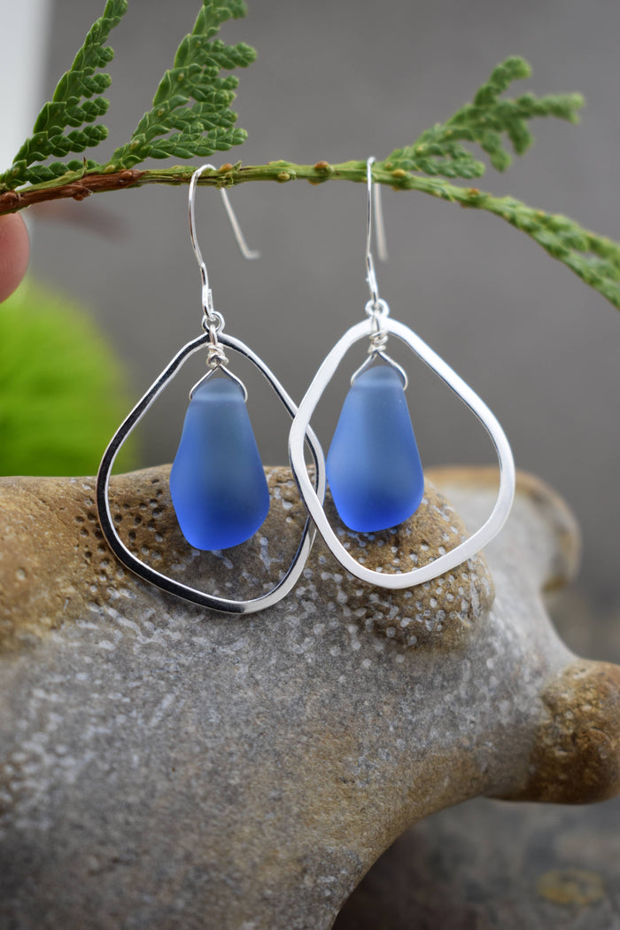 Stylish display of Organic Eco Glass Earrings on a natural background, emphasizing their eco-friendly design and craftsmanship.