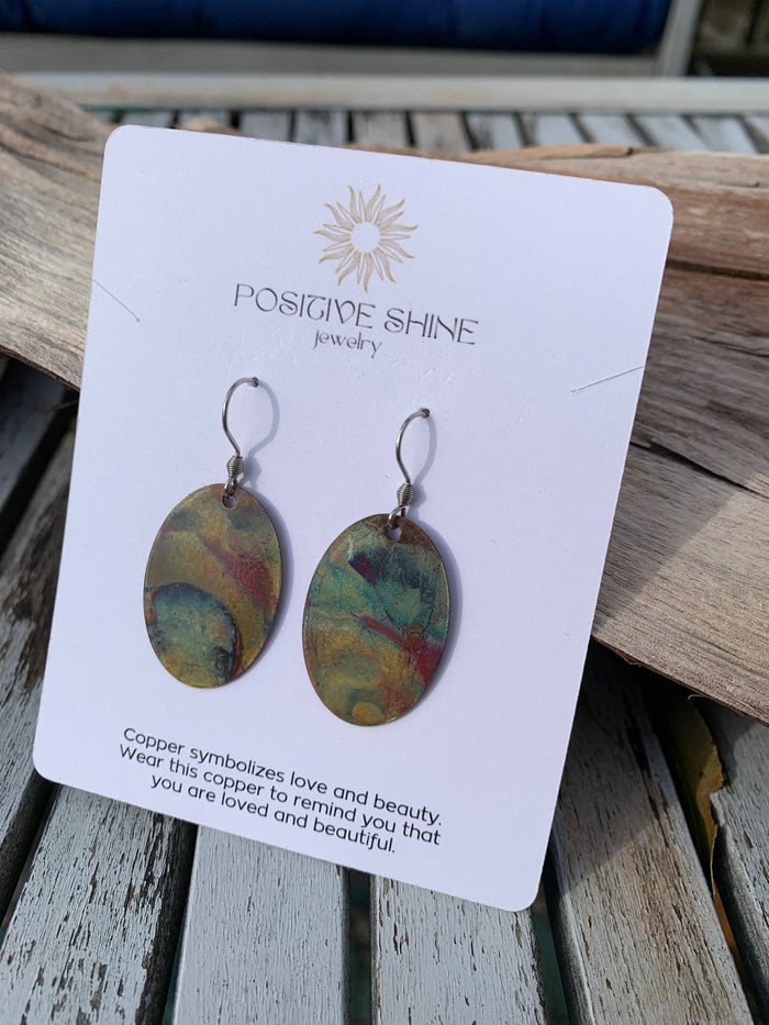 Oval Copper Earrings displayed as lightweight artisan jewelry for everyday wear