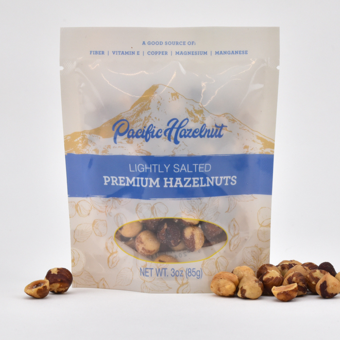 Package of Pacific Hazelnut lightly salted premium hazelnuts on a white background