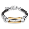 The Astro Diamond Bracelet for men featuring a black braided leather strap, silver and gold-tone metal accents, and a center cubic zirconia stone, bold by design.